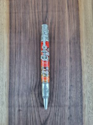 Stylo-bille Vigo, résine hybride orangée, branchettes et grille alvéolée